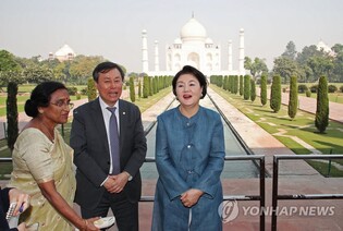 Controversy intensifies over ex-first lady's visit to India