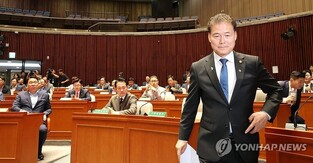 Unification minister says N. Korea's socialist rationing system has collapsed