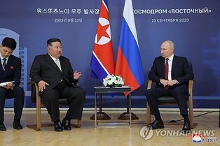 (LEAD) Putin says Russia, N. Korea to develop alternative settlement system
