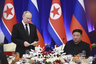 (LEAD) N. Korea, Russia agree to offer military assistance 'without delay' if either is attacked: KCNA