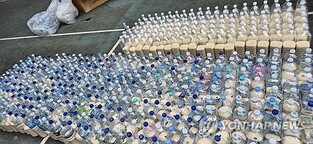 Defector group sends more plastics bottles containing rice to N. Korea, raising concerns about Pyongyang's trash balloons