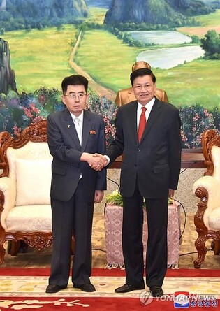 N. Korean leader exchanges greetings with Laotian president to mark 50th anniversary of diplomatic ties