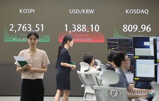 Seoul shares fall over 1 pct as chip stocks slip