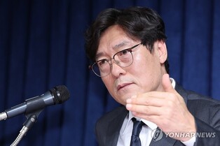 Senior football official booked on obstruction of business charges over nat'l team coach hiring