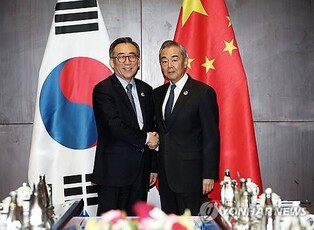 Top diplomats of S. Korea, China meet in Laos