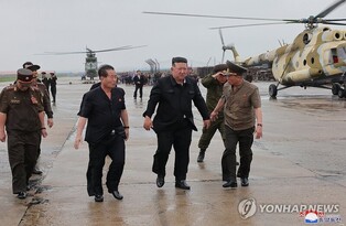 (LEAD) N. Korea's Kim guides rescue operation for residents in flood-hit areas