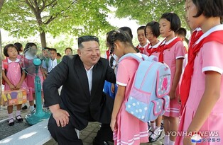 N. Korea's Kim attends demonstration class for children from flood-hit region
