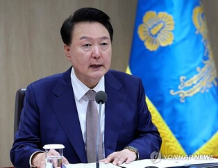 Yoon raps calls to abandon unification goal as 'unconstitutional'