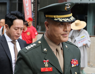 Ex-chief Marine investigator at military court