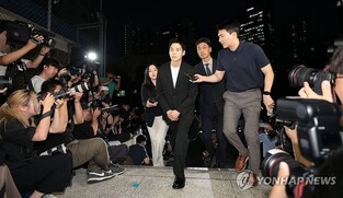 BTS' Suga sentenced to 15 mln-won fine for DUI offense