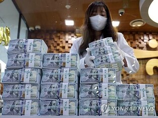 Foreign reserves up for 3rd month in Sept. on weak dollar, investment gains