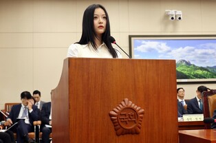 Photos of NewJeans' Hanni Testifying at National Assembly2
