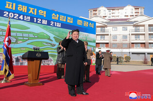 N.K. leader attends ceremony for rebuilt houses in flood-hit area