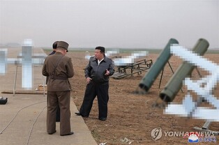 (LEAD) N. Korea preparing for additional troop deployment, suicide drone supply to Russia: Seoul
