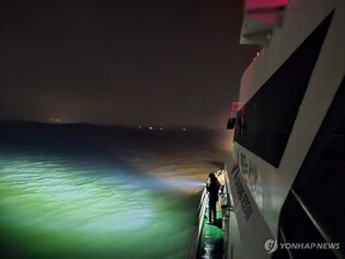 (2nd LD) Car ferry capsizes off southwestern coast; 2 rescued, 5 missing