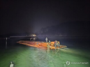 Captain found dead after car ferry capsizes off southwestern coast, 4 still missing