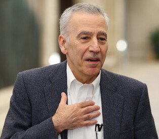 Outgoing top U.S. envoy returns home