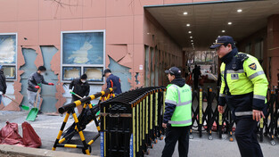 Recovery work at court attacked by protesters