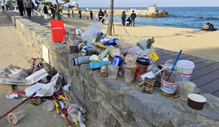 Beach littered with trash