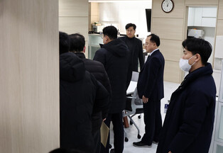 Office of ex-interior minister raided in martial law probe