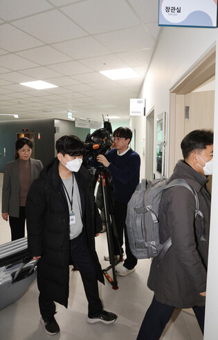 Office of ex-interior minister raided in martial law probe