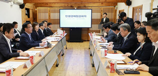Acting president at meeting on improving people's livelihoods