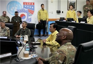 N. Korea's Kim supervises test-firing of new air defense missiles: KCNA