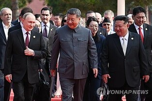 (6th LD) Kim joins Putin, Xi at military parade, in display of defiance against West