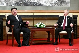 (LEAD) Kim thanks Putin for praising N. Korean troops in Russia as they meet in Beijing