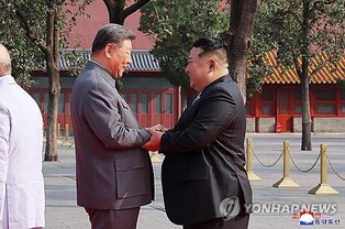 (4th LD) N. Korea's Kim holds talks with China's Xi in Beijing: state media