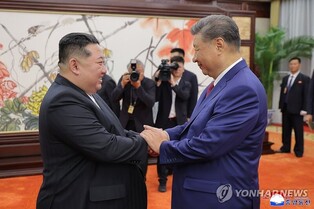 (News Focus) Kim-Xi pledge to boost cooperation brings China's denuclearization goal into limbo