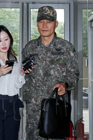 Ex-defense chief summoned by special counsel
