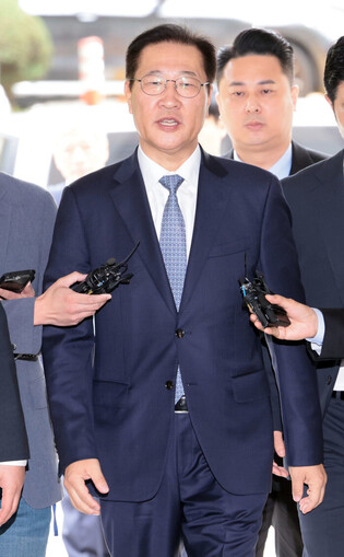 Court to decide on arrest warrant for ex-justice minister