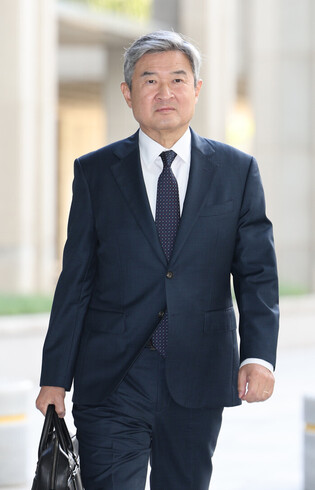Summons of ex-spy chief
