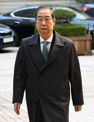Ex-PM attends hearing of trial over Yoon's insurrection charges