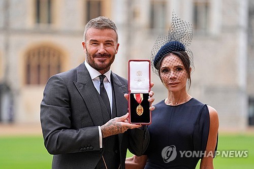 Beckham knighted to the tune of 'Golden'