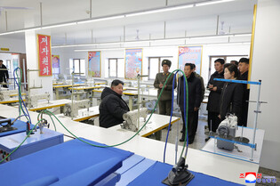 N.K. leader inspects regional factories ahead of official opening