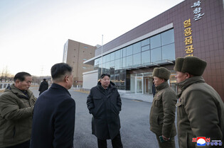 N.K. leader inspects regional factories ahead of official opening