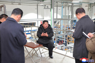 N.K. leader inspects regional factories ahead of official opening