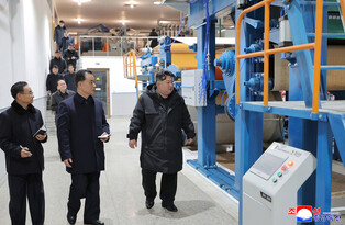 N.K. leader inspects regional factories ahead of official opening