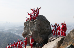 Santa climbing mountain