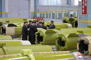 N.K. leader calls for expanding missile, shell production capacity