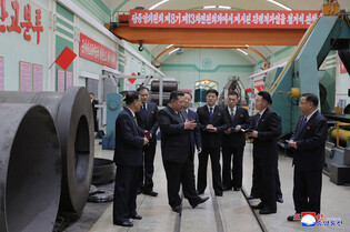 N.K. leader calls for expanding missile, shell production capacity