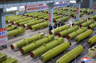N.K. leader calls for expanding missile, shell production capacity