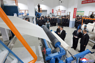 N. Korea's Kim attends opening of new paper mill