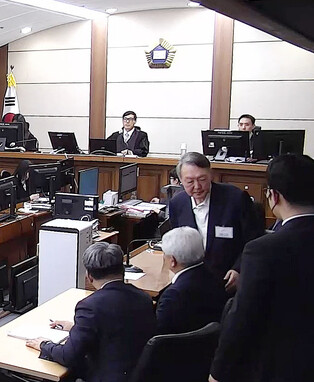 Yoon sentenced to 5 yrs in prison over obstruction of justice