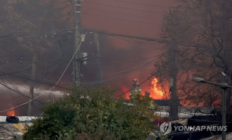 Fire at shantytown i...