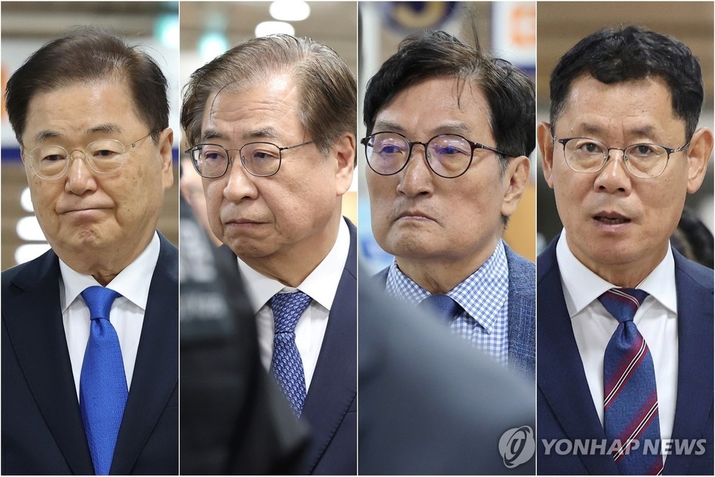 This composite photo shows (from L to R) Chung Eui-yong, former national security adviser; former National Intelligence Service Director Suh Hoon; former presidential chief of staff Noh Young-min; and former Unification Minister Kim Yeon-chul attending a hearing at the Seoul High Court in southern Seoul on Oct. 21, 2026. (Yonhap)