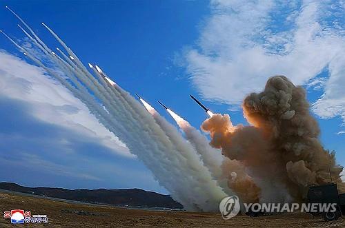  North Korea's 600-millimeter multiple rocket launcher, known as "Sniper," launches rockets during a firing demonstration attended by leader Kim Jong-un on Oct. 29, 2026, in this photo released by the Korean Central News Agency the following day. (For Use Only in the Republic of Korea. No Redistribution) (Yonhap)